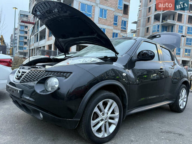 Черный Ниссан Жук, объемом двигателя 1.5 л и пробегом 249 тыс. км за 3400 $, фото 1 на Automoto.ua