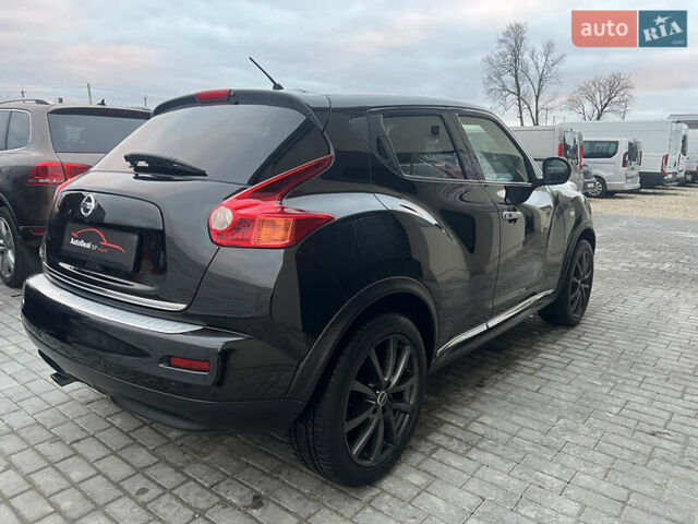 Черный Ниссан Жук, объемом двигателя 1.6 л и пробегом 190 тыс. км за 10850 $, фото 8 на Automoto.ua