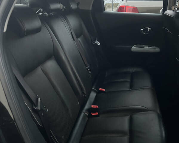 Черный Ниссан Жук, объемом двигателя 1.6 л и пробегом 190 тыс. км за 10850 $, фото 24 на Automoto.ua