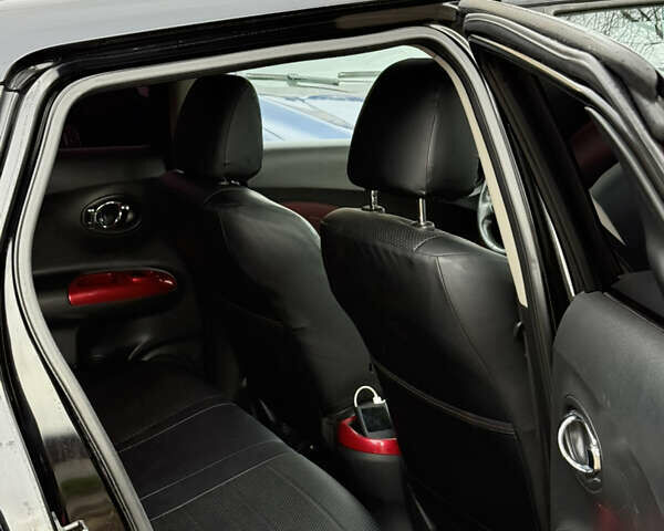 Черный Ниссан Жук, объемом двигателя 1.6 л и пробегом 118 тыс. км за 9600 $, фото 5 на Automoto.ua