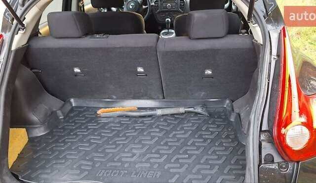 Черный Ниссан Жук, объемом двигателя 1.6 л и пробегом 170 тыс. км за 11000 $, фото 1 на Automoto.ua