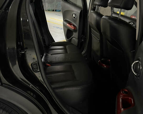 Черный Ниссан Жук, объемом двигателя 1.5 л и пробегом 250 тыс. км за 3950 $, фото 3 на Automoto.ua