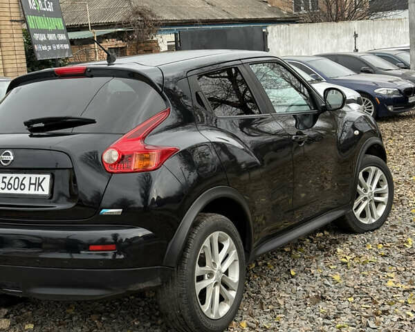 Черный Ниссан Жук, объемом двигателя 1.6 л и пробегом 118 тыс. км за 9600 $, фото 2 на Automoto.ua