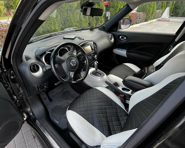 Черный Ниссан Жук, объемом двигателя 1.6 л и пробегом 115 тыс. км за 9900 $, фото 8 на Automoto.ua