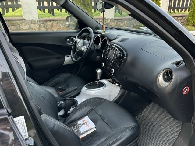 Чорний Ніссан Жук, об'ємом двигуна 1.6 л та пробігом 216 тис. км за 11000 $, фото 8 на Automoto.ua