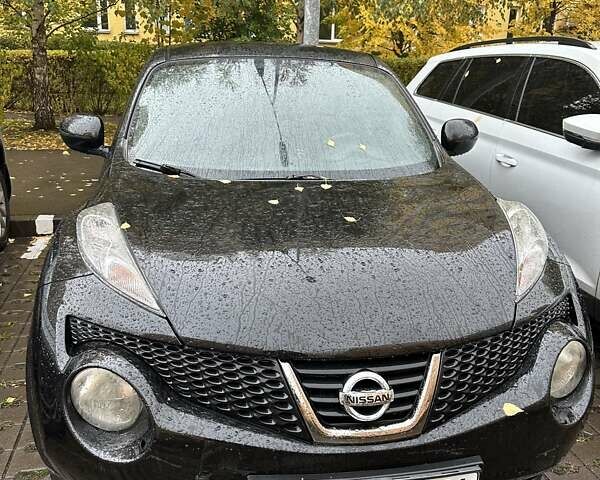 Черный Ниссан Жук, объемом двигателя 1.6 л и пробегом 103 тыс. км за 9700 $, фото 1 на Automoto.ua