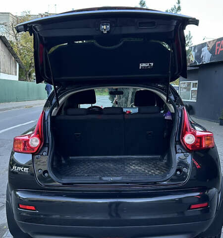 Черный Ниссан Жук, объемом двигателя 1.6 л и пробегом 102 тыс. км за 10999 $, фото 2 на Automoto.ua