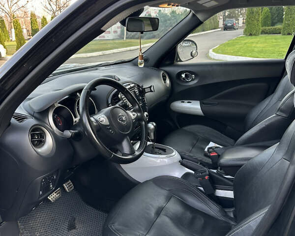 Черный Ниссан Жук, объемом двигателя 1.62 л и пробегом 216 тыс. км за 11000 $, фото 9 на Automoto.ua