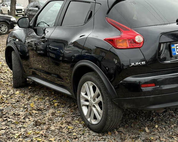 Черный Ниссан Жук, объемом двигателя 1.6 л и пробегом 118 тыс. км за 9600 $, фото 3 на Automoto.ua