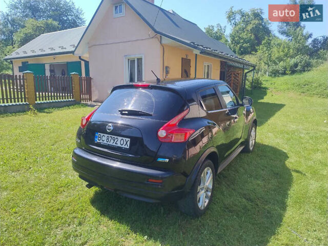 Черный Ниссан Жук, объемом двигателя 1.46 л и пробегом 190 тыс. км за 9600 $, фото 5 на Automoto.ua