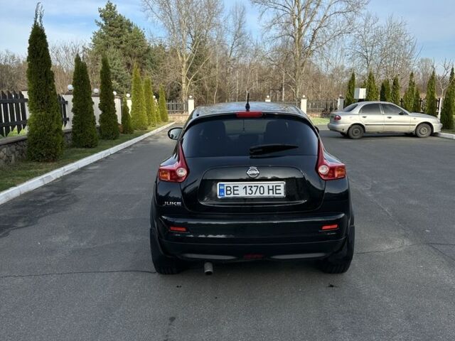 Чорний Ніссан Жук, об'ємом двигуна 1.6 л та пробігом 216 тис. км за 11000 $, фото 6 на Automoto.ua