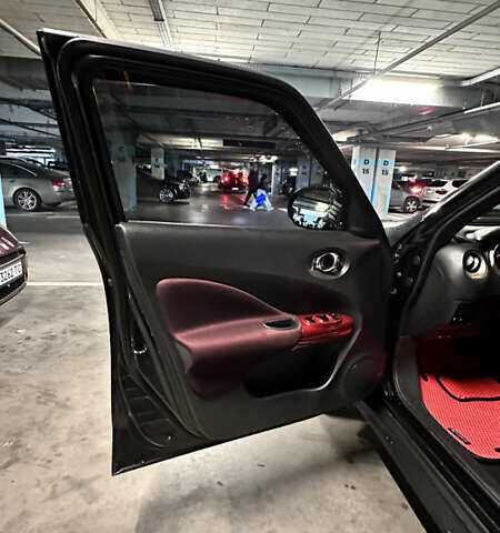 Черный Ниссан Жук, объемом двигателя 1.6 л и пробегом 102 тыс. км за 10999 $, фото 14 на Automoto.ua