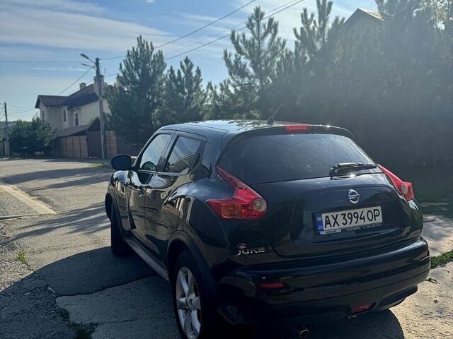 Чорний Ніссан Жук, об'ємом двигуна 1.6 л та пробігом 195 тис. км за 7500 $, фото 5 на Automoto.ua