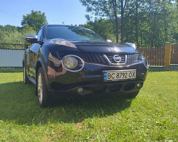 Черный Ниссан Жук, объемом двигателя 1.46 л и пробегом 190 тыс. км за 9600 $, фото 1 на Automoto.ua