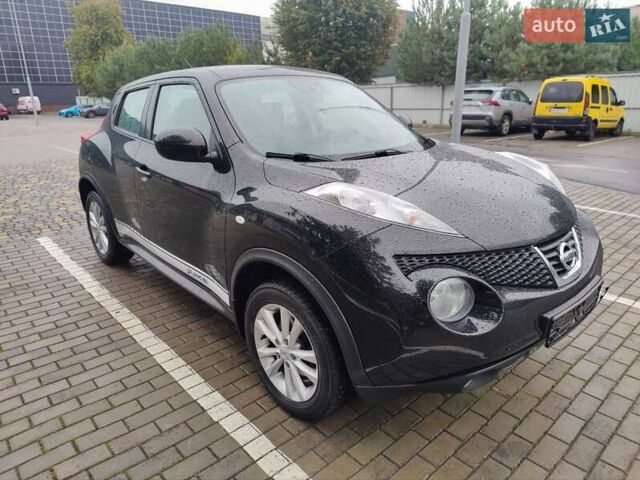 Черный Ниссан Жук, объемом двигателя 1.6 л и пробегом 237 тыс. км за 10900 $, фото 1 на Automoto.ua