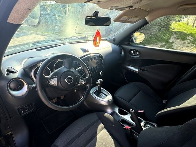 Чорний Ніссан Жук, об'ємом двигуна 1.6 л та пробігом 195 тис. км за 7500 $, фото 8 на Automoto.ua