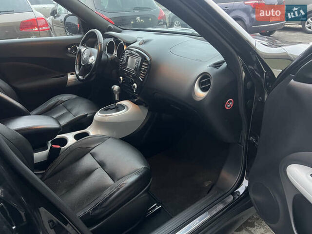 Черный Ниссан Жук, объемом двигателя 1.6 л и пробегом 190 тыс. км за 10850 $, фото 18 на Automoto.ua