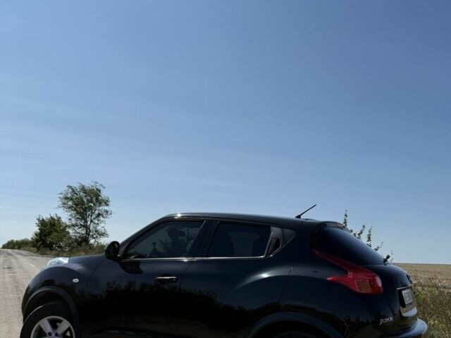 Черный Ниссан Жук, объемом двигателя 1.6 л и пробегом 128 тыс. км за 8800 $, фото 8 на Automoto.ua