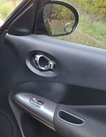 Черный Ниссан Жук, объемом двигателя 1.6 л и пробегом 170 тыс. км за 11000 $, фото 5 на Automoto.ua