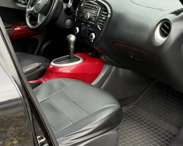 Черный Ниссан Жук, объемом двигателя 1.6 л и пробегом 118 тыс. км за 9600 $, фото 4 на Automoto.ua