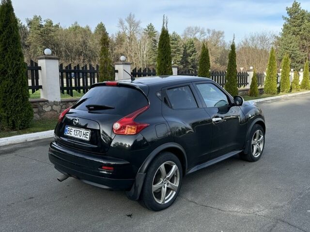 Чорний Ніссан Жук, об'ємом двигуна 1.6 л та пробігом 216 тис. км за 11000 $, фото 5 на Automoto.ua