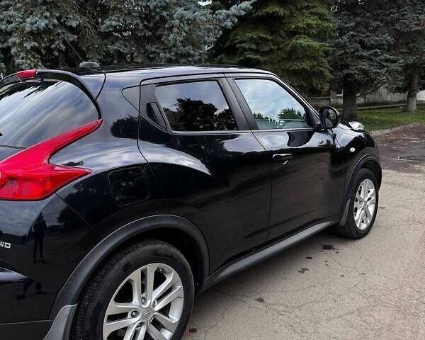 Черный Ниссан Жук, объемом двигателя 1.6 л и пробегом 197 тыс. км за 10500 $, фото 9 на Automoto.ua