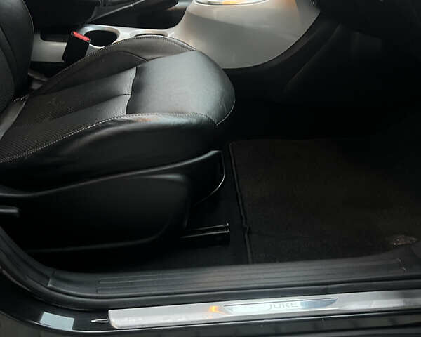 Черный Ниссан Жук, объемом двигателя 1.6 л и пробегом 190 тыс. км за 10850 $, фото 19 на Automoto.ua