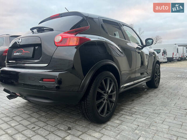 Черный Ниссан Жук, объемом двигателя 1.6 л и пробегом 190 тыс. км за 10850 $, фото 10 на Automoto.ua