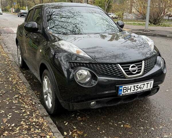 Черный Ниссан Жук, объемом двигателя 1.6 л и пробегом 115 тыс. км за 11000 $, фото 3 на Automoto.ua