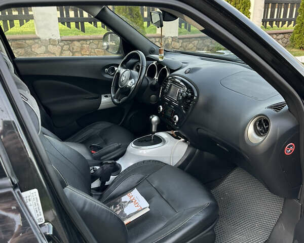 Черный Ниссан Жук, объемом двигателя 1.62 л и пробегом 216 тыс. км за 11000 $, фото 7 на Automoto.ua