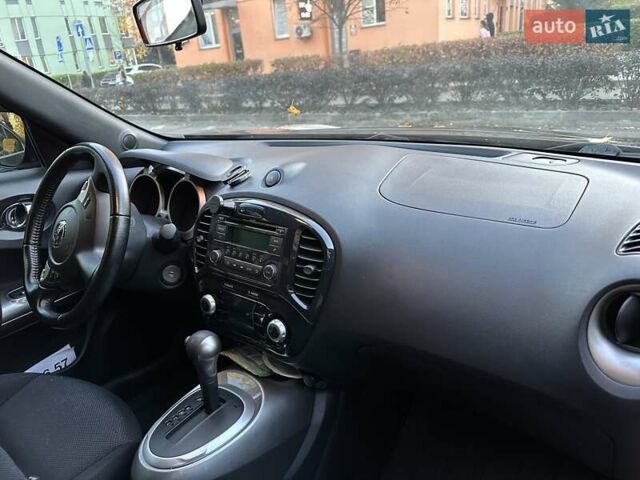Черный Ниссан Жук, объемом двигателя 1.6 л и пробегом 103 тыс. км за 9700 $, фото 5 на Automoto.ua