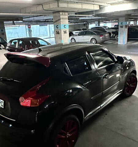 Черный Ниссан Жук, объемом двигателя 1.6 л и пробегом 102 тыс. км за 10999 $, фото 11 на Automoto.ua