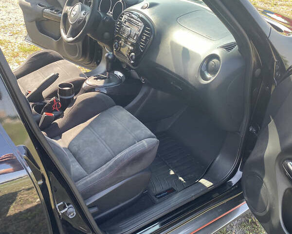 Черный Ниссан Жук, объемом двигателя 1.6 л и пробегом 169 тыс. км за 11800 $, фото 13 на Automoto.ua