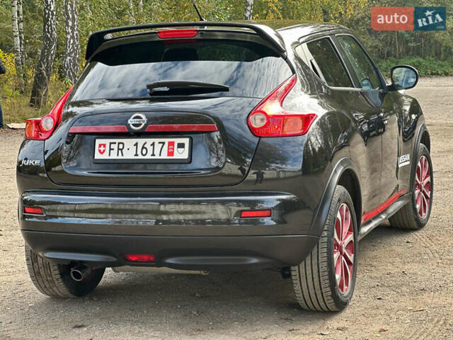 Черный Ниссан Жук, объемом двигателя 1.6 л и пробегом 145 тыс. км за 10600 $, фото 11 на Automoto.ua
