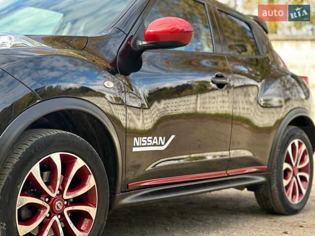 Черный Ниссан Жук, объемом двигателя 1.6 л и пробегом 145 тыс. км за 10600 $, фото 8 на Automoto.ua