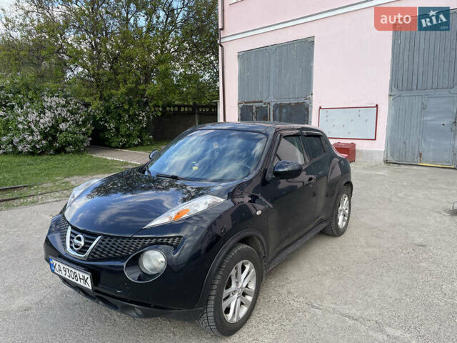 Черный Ниссан Жук, объемом двигателя 1.62 л и пробегом 150 тыс. км за 9750 $, фото 1 на Automoto.ua