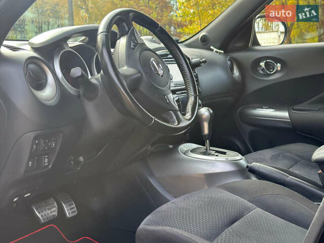 Черный Ниссан Жук, объемом двигателя 1.6 л и пробегом 145 тыс. км за 10600 $, фото 15 на Automoto.ua