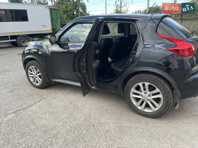 Черный Ниссан Жук, объемом двигателя 1.62 л и пробегом 150 тыс. км за 9750 $, фото 8 на Automoto.ua