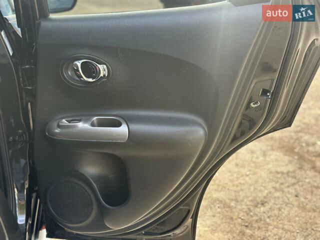 Черный Ниссан Жук, объемом двигателя 1.6 л и пробегом 145 тыс. км за 10600 $, фото 29 на Automoto.ua