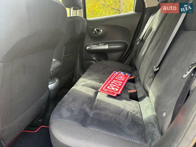 Черный Ниссан Жук, объемом двигателя 1.6 л и пробегом 145 тыс. км за 10600 $, фото 24 на Automoto.ua