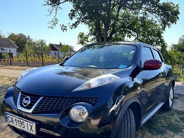 Черный Ниссан Жук, объемом двигателя 1.5 л и пробегом 245 тыс. км за 9700 $, фото 2 на Automoto.ua