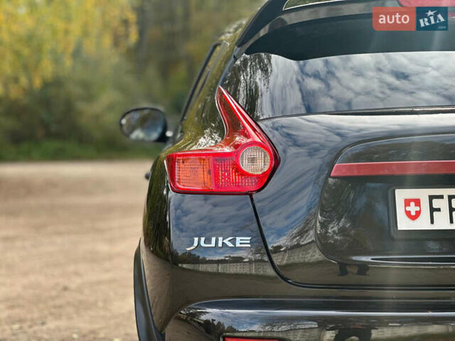 Черный Ниссан Жук, объемом двигателя 1.6 л и пробегом 145 тыс. км за 10600 $, фото 12 на Automoto.ua