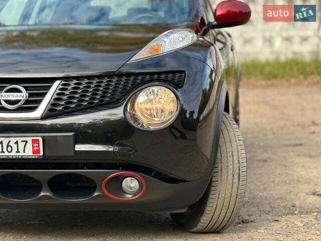 Черный Ниссан Жук, объемом двигателя 1.6 л и пробегом 145 тыс. км за 10600 $, фото 2 на Automoto.ua