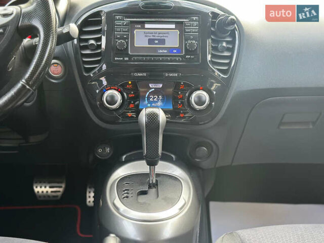 Черный Ниссан Жук, объемом двигателя 1.6 л и пробегом 145 тыс. км за 10600 $, фото 21 на Automoto.ua