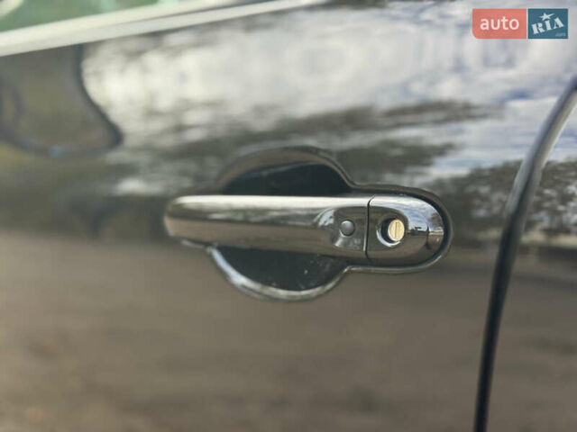 Черный Ниссан Жук, объемом двигателя 1.6 л и пробегом 145 тыс. км за 10600 $, фото 14 на Automoto.ua