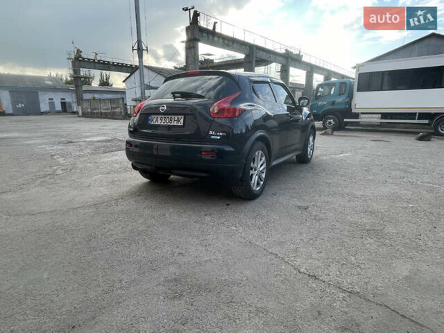 Черный Ниссан Жук, объемом двигателя 1.62 л и пробегом 150 тыс. км за 9750 $, фото 2 на Automoto.ua