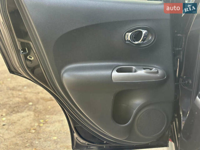 Черный Ниссан Жук, объемом двигателя 1.6 л и пробегом 145 тыс. км за 10600 $, фото 28 на Automoto.ua