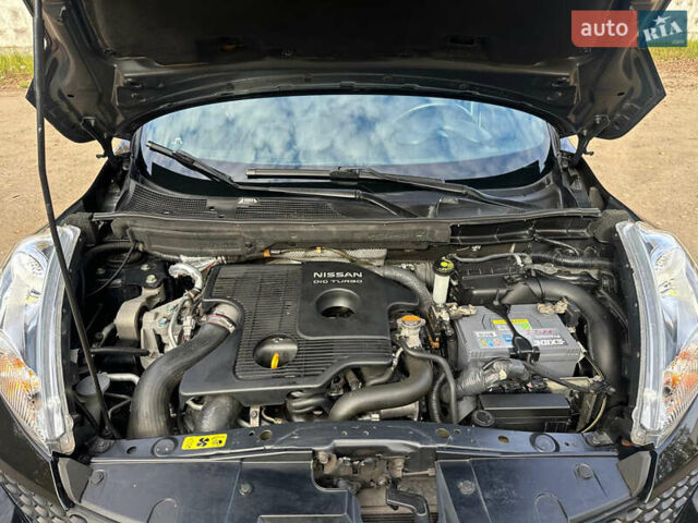Черный Ниссан Жук, объемом двигателя 1.6 л и пробегом 145 тыс. км за 10600 $, фото 34 на Automoto.ua