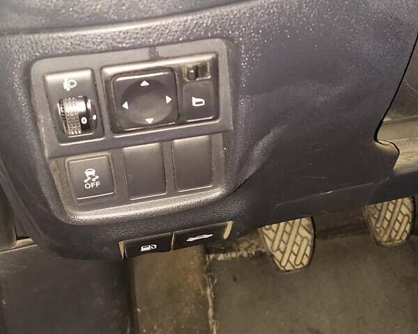 Черный Ниссан Жук, объемом двигателя 1.46 л и пробегом 146 тыс. км за 10700 $, фото 1 на Automoto.ua