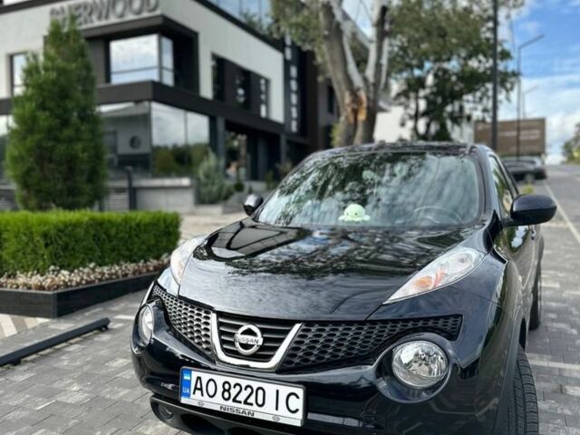 Черный Ниссан Жук, объемом двигателя 1.6 л и пробегом 184 тыс. км за 10500 $, фото 1 на Automoto.ua